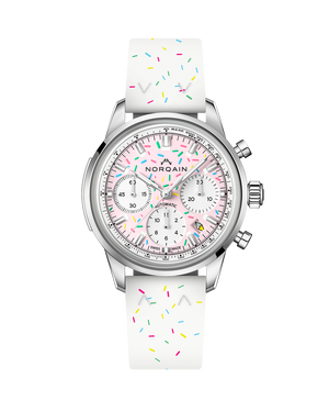 Watch with a white strap featuring colorful sprinkles on a white background