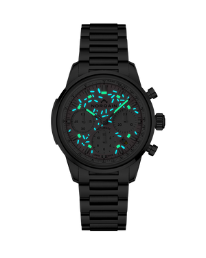 Front view of Freedom Chrono Enjoy Life Sprinkles watch showcasing glowing sprinkle style hour markers on black steel bracelet with dark background