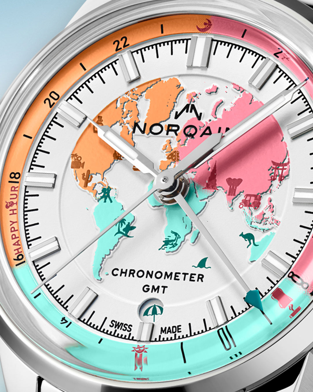 Upclose Norqain timepiece with colorful face on a light blue background