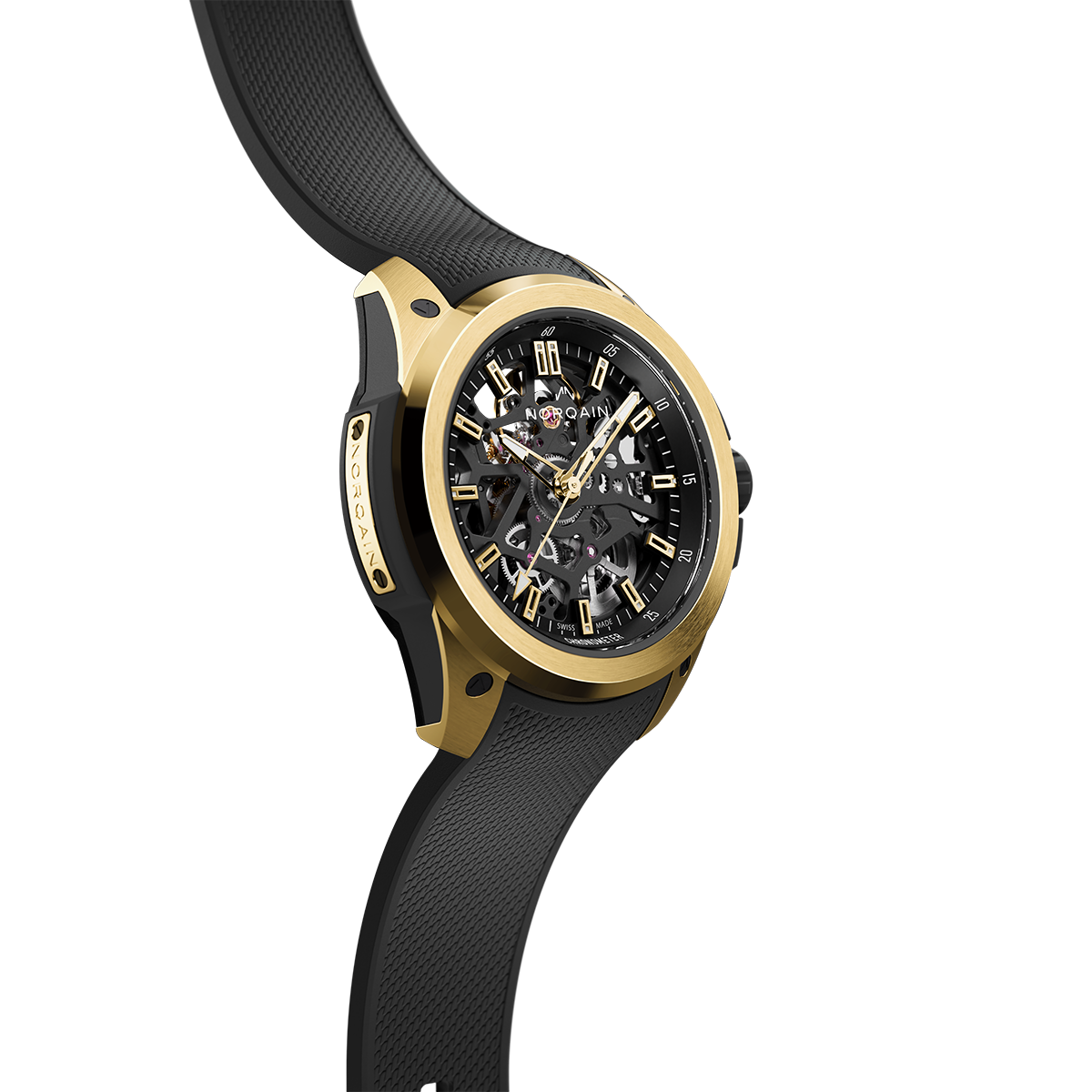Three-quarter view of Wild ONE Skeleton 39mm yellow gold watch showing skeleton dial and black rubber strap on white background