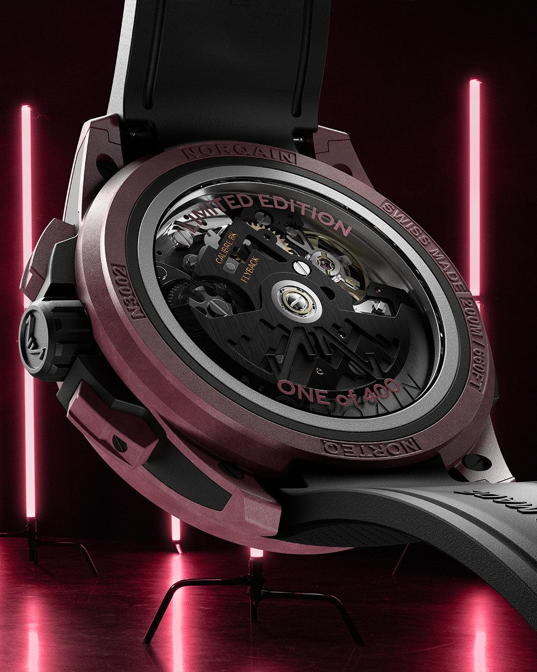 Close-up of a luxury watch with visible brand name against a dark background with red lights.