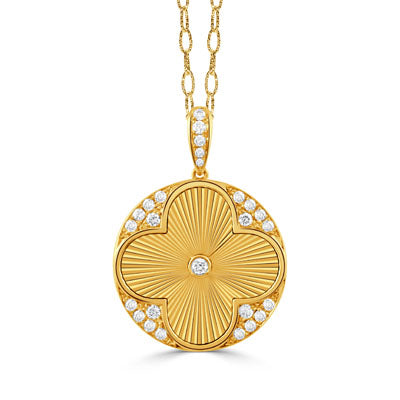 Front view of 18K yellow gold round diamond pendant with clover motif, central diamond and pavé diamonds on white background
