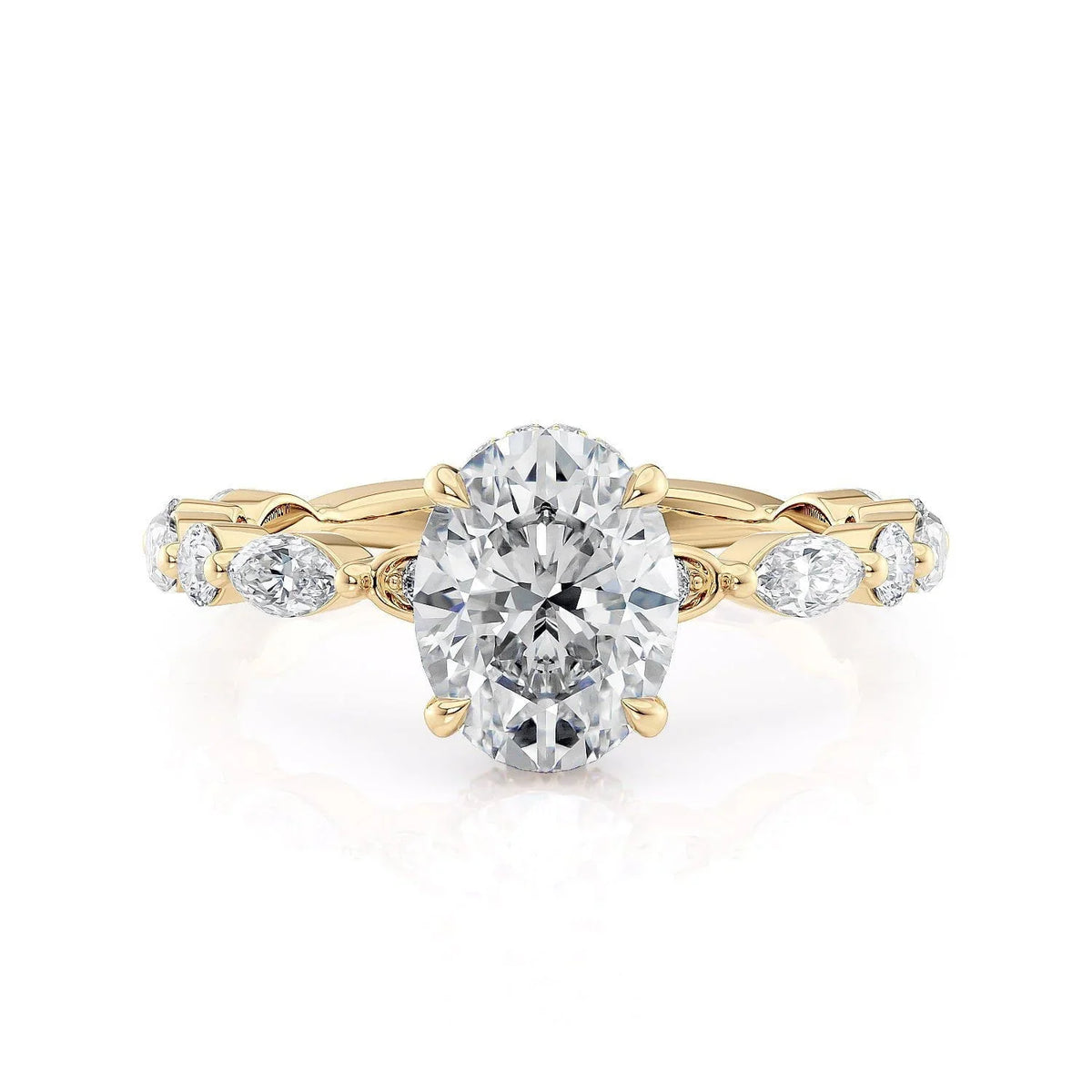 yellow gold with oval center and marquise side diamonds on a white background