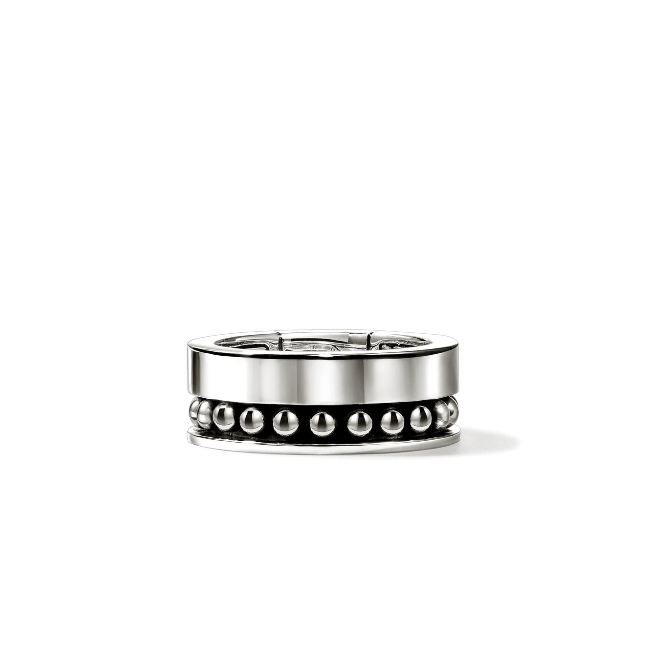 Silver ring with studs on a white background