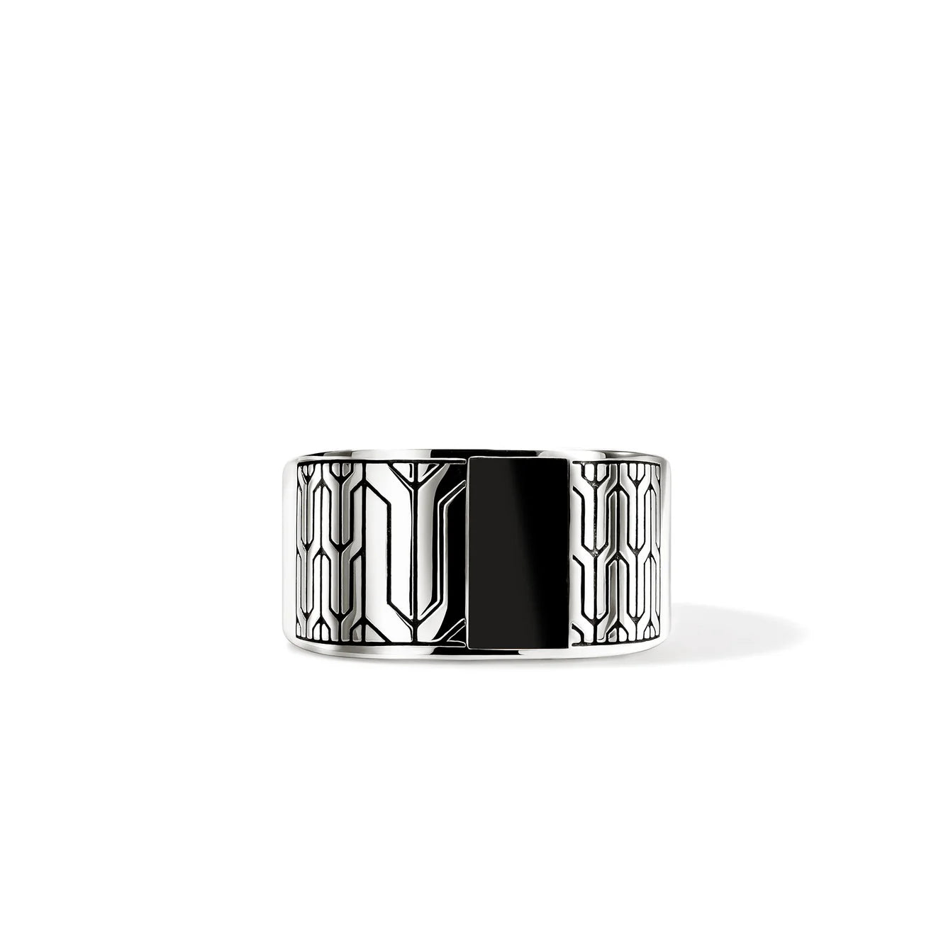 A wide silver-toned cuff ring with a bold black center panel and geometric line patterns on the outer sides, shown on a clean white background.