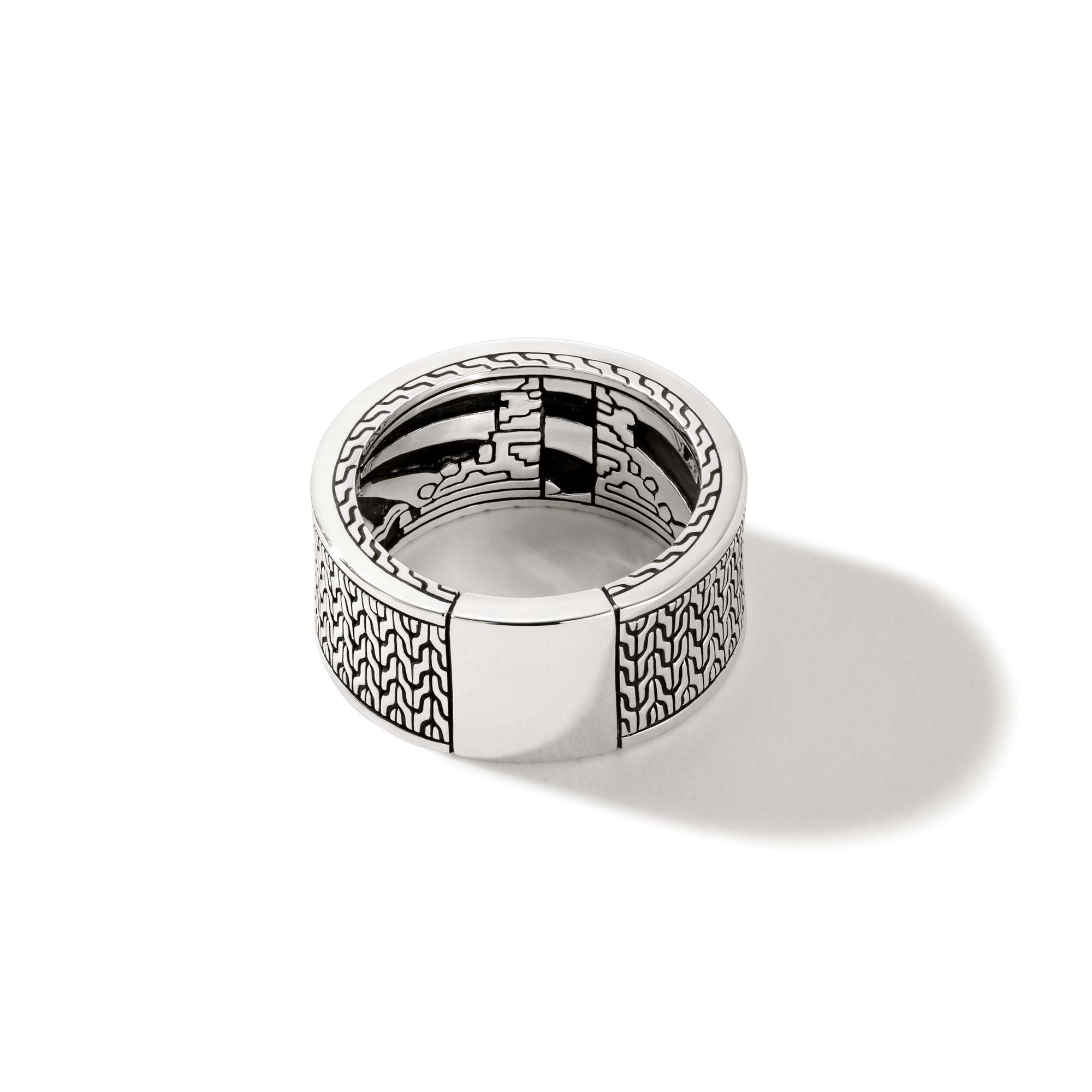 Back of Carved Chain Inlay Band Ring showing silver band with chain inlay and polished panel on white background