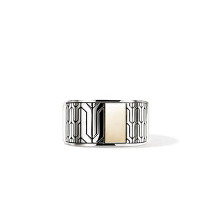 Silver and gold with black trim ring on a white background