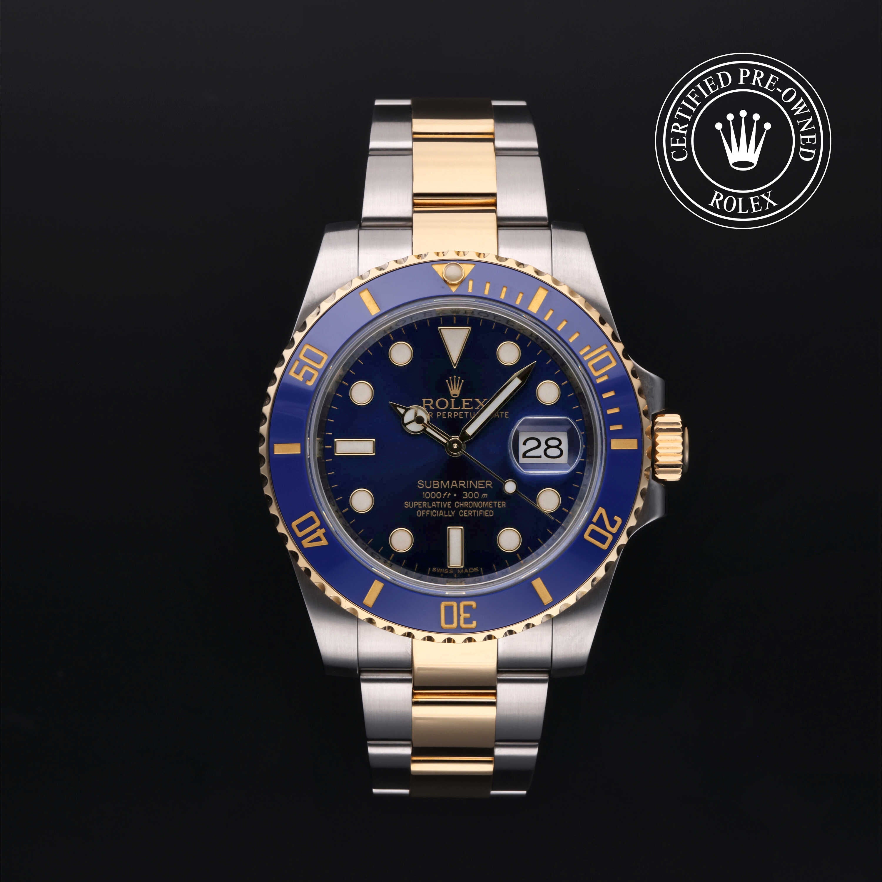 Two-tone Rolex watch with blue dial on a black background, featuring a 'Certified Pre-Owned Rolex' label.