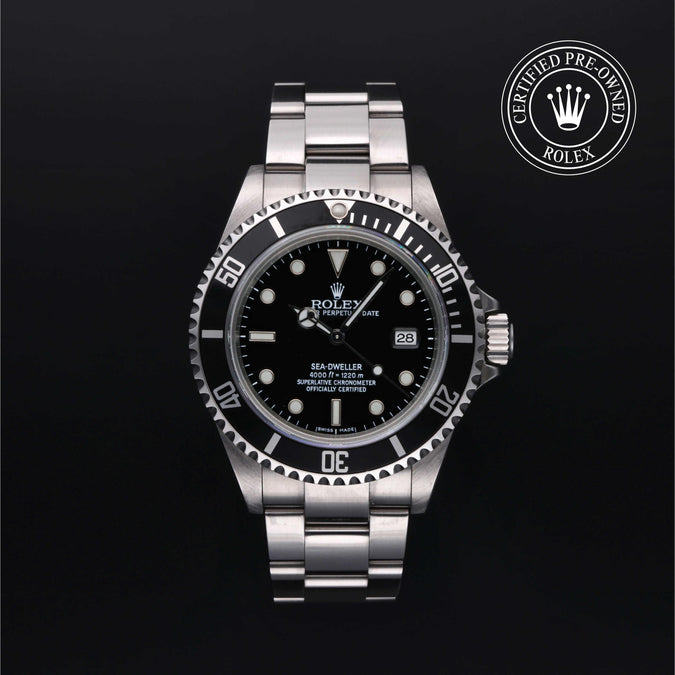 Rolex Sea-Dweller watch with black dial on a dark background, featuring a Certified Pre-Owned Rolex logo.