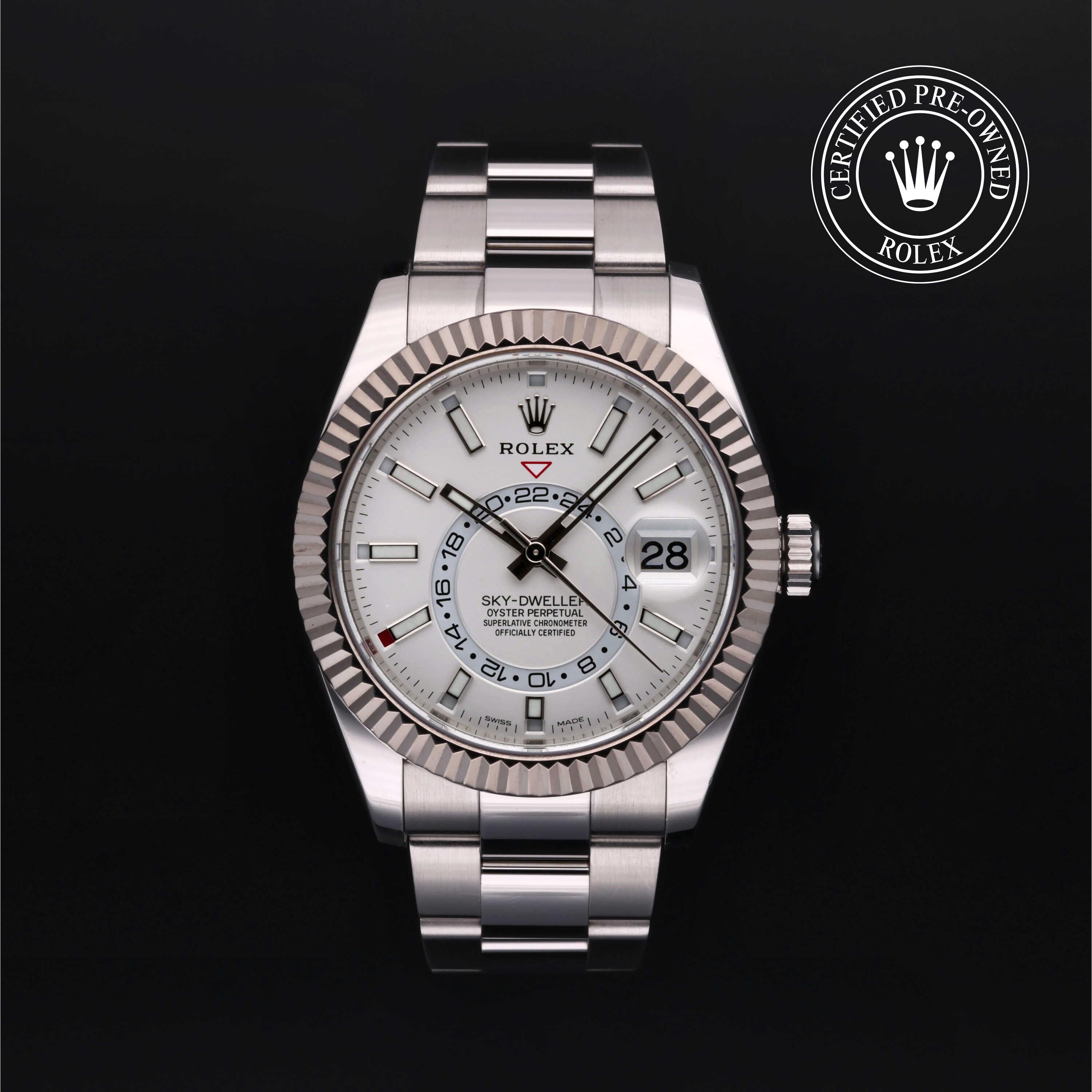 Front of Rolex Sky-Dweller 42mm, fluted bezel, white dial, Oyster bracelet on black background with Certified Pre-Owned seal