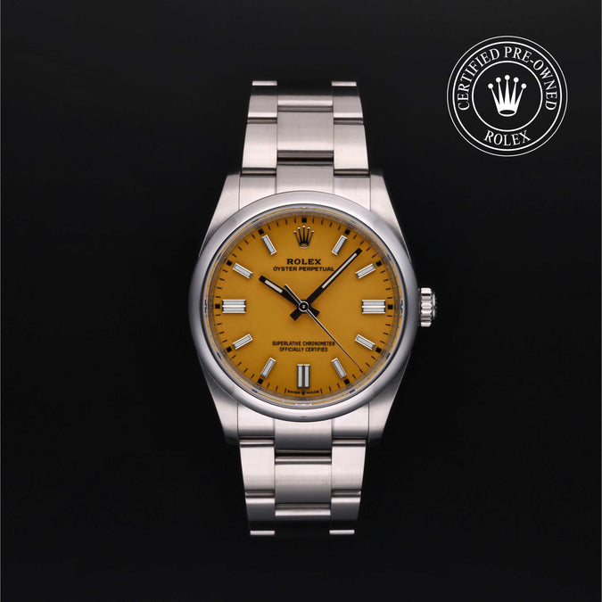 Rolex watch with yellow face and silver bracelet on a black background, featuring a 'Certified Pre-Owned Rolex' logo.
