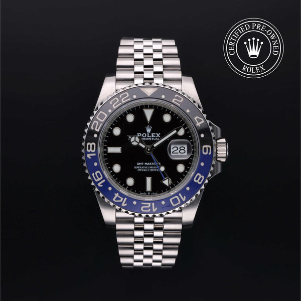 Front of GMT-Master II with black dial, blue-and-black 24-hour bezel, magnified date and Jubilee steel bracelet on black