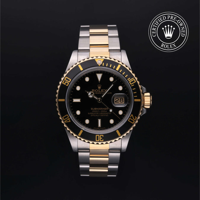 A Rolex Submariner watch with a two-tone steel and gold bracelet, featuring a black dial and a black and gold rotating bezel, set against a solid black background with a 'Certified Pre-Owned Rolex' emblem in the top right corner.