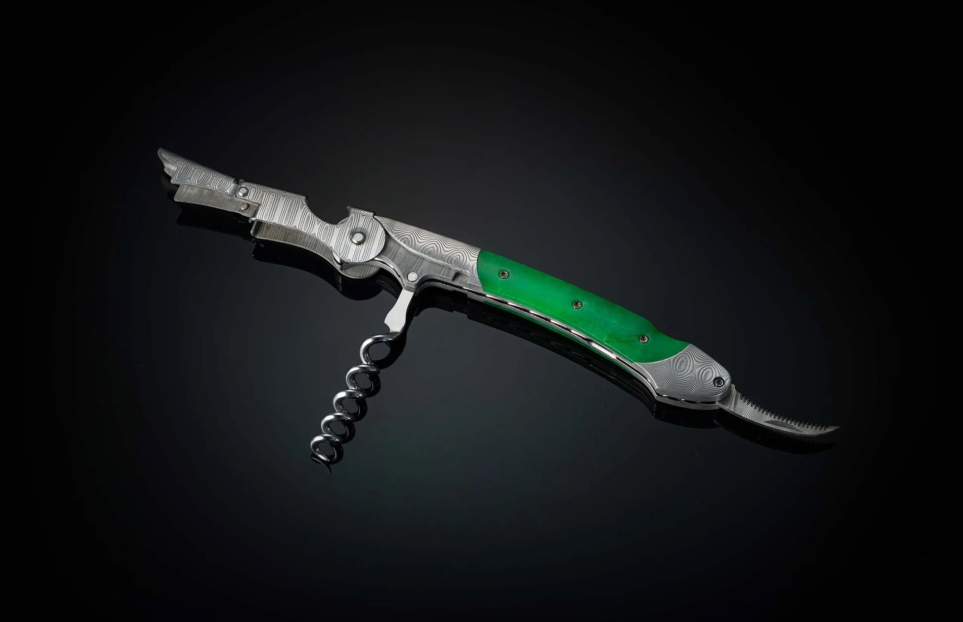 Angled open view of William Henry Canopy wine opener and corkscrew with green handle, damascus steel detail against black