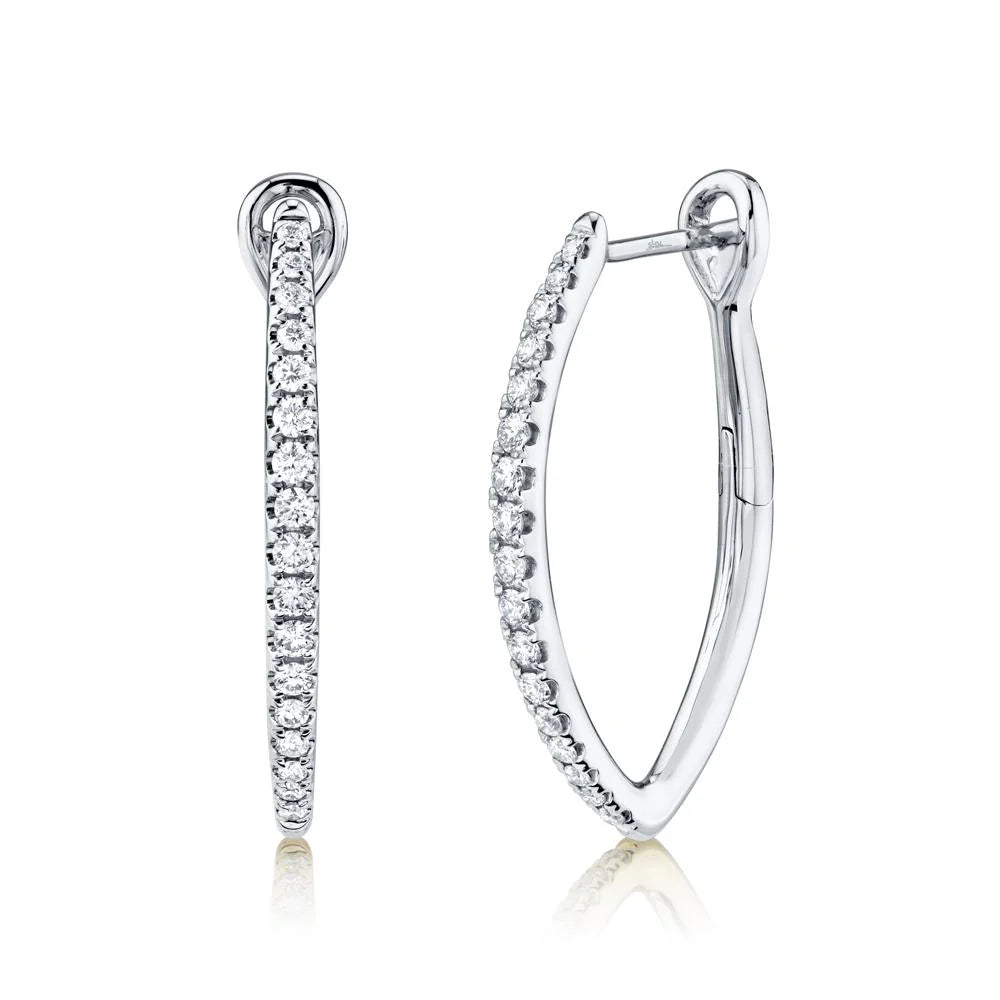 Hoop earrings with channel-set round diamonds on polished white gold, shown front and side views.