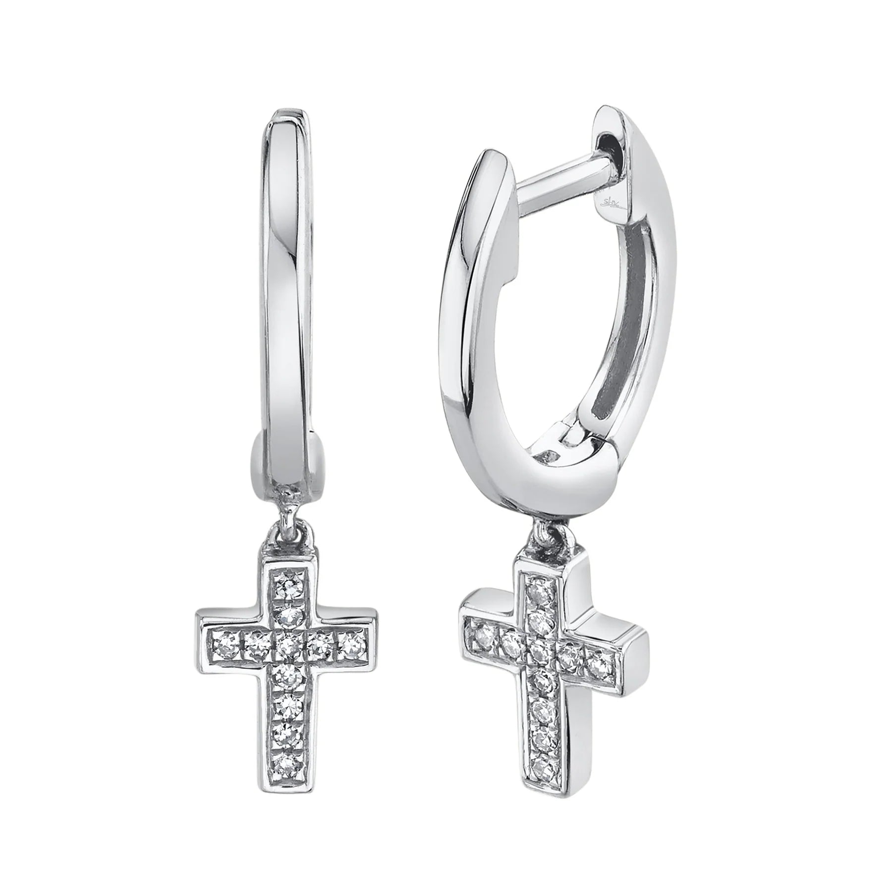 Polished silver huggie hoop earrings with dangling cross charms set with small clear stones