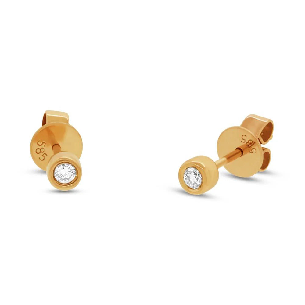 Gold bezel-set round diamond stud earrings with '585' hallmarks on the posts.
