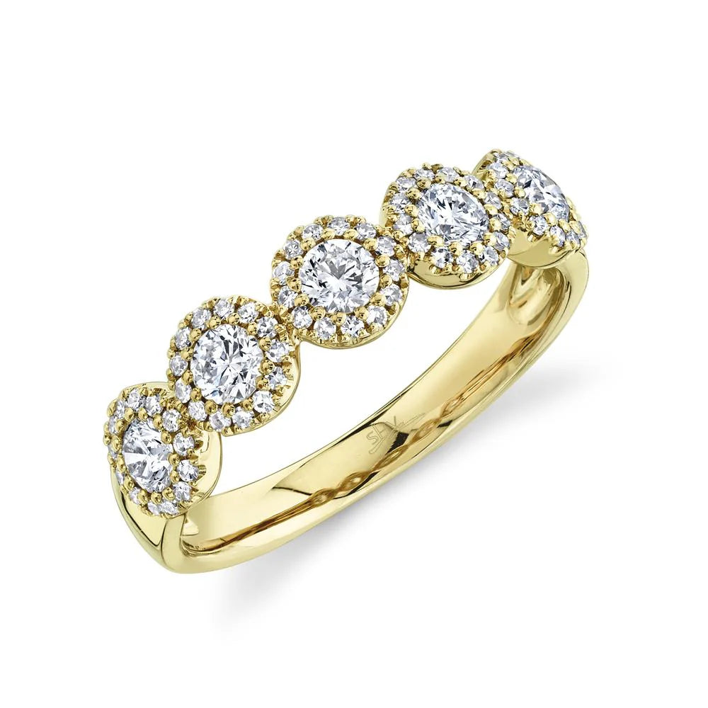 Yellow gold band ring with five round halo-set diamonds across the top