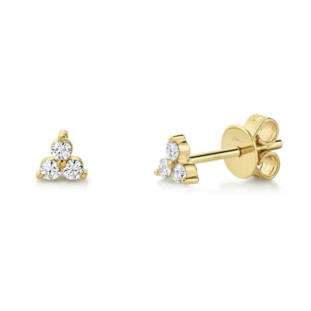 Front and side views of 0.15ctw yellow gold diamond stud with three-stone cluster and butterfly back on white background