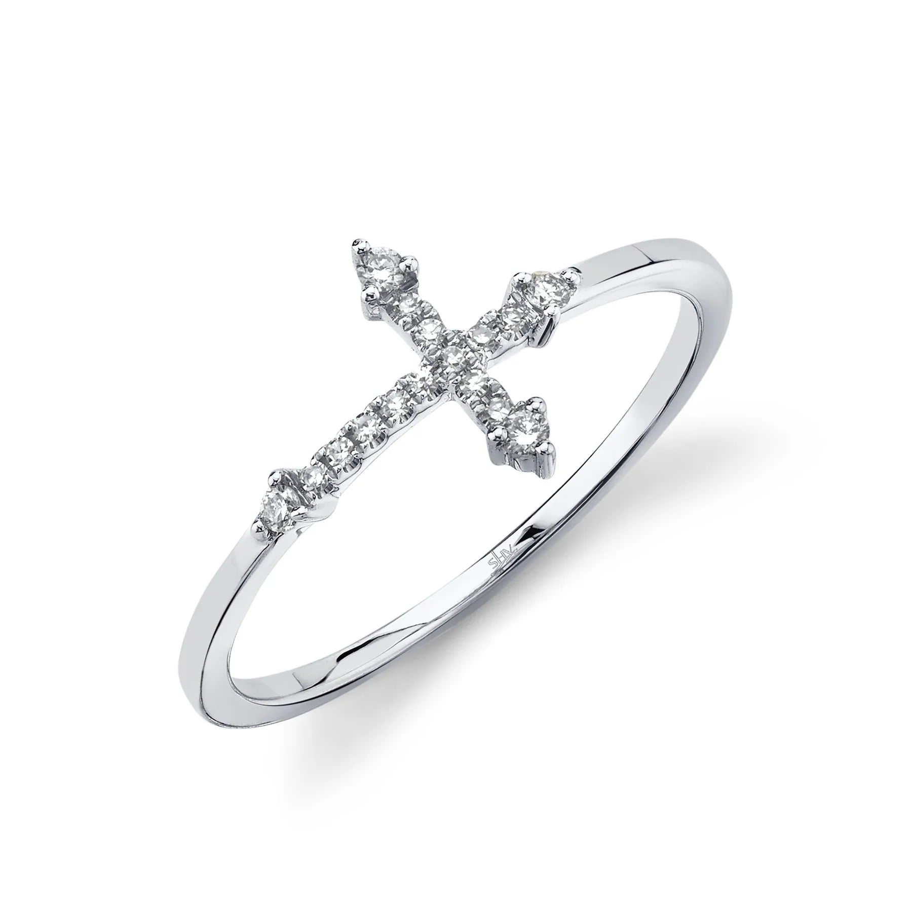Thin sterling silver ring with a horizontal diamond cross, inner-band engraving 'SILV'.