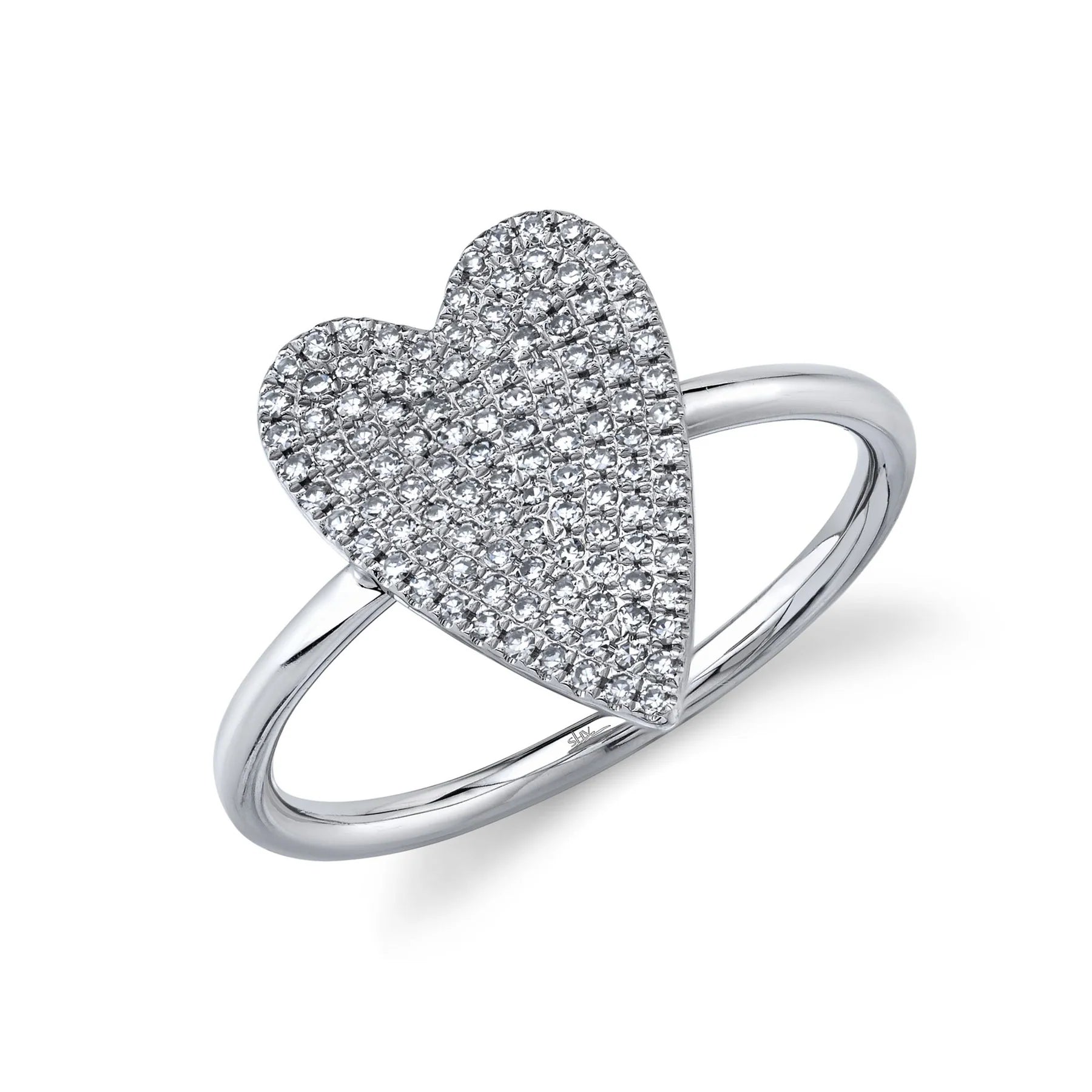 Three-quarter view of 14K white gold diamond pavé heart ring showing pavé diamonds on heart top, white background