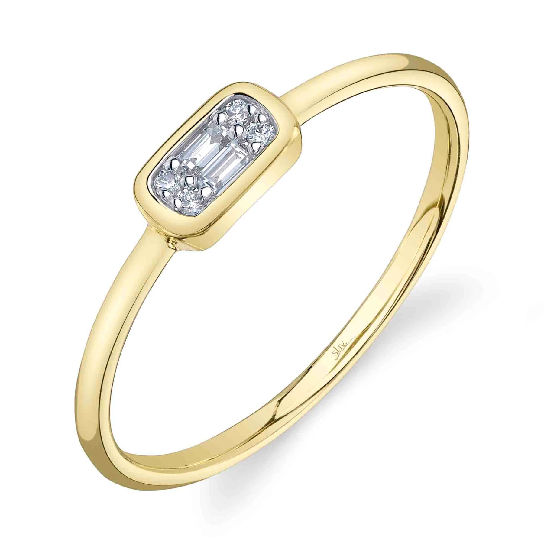 Thin yellow gold band with a small rectangular cluster of baguette and round diamonds