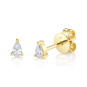Gold stud earrings with pear-shaped diamonds in three-prong settings; back disc stamped shv