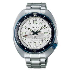 Seiko watch with silver metal strap on a white background