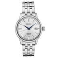 Front view of Seiko Presage SRPB77 automatic watch showcasing silver sunburst dial, blued hands, date at 3 o'clock and stainless steel bracelet on white background