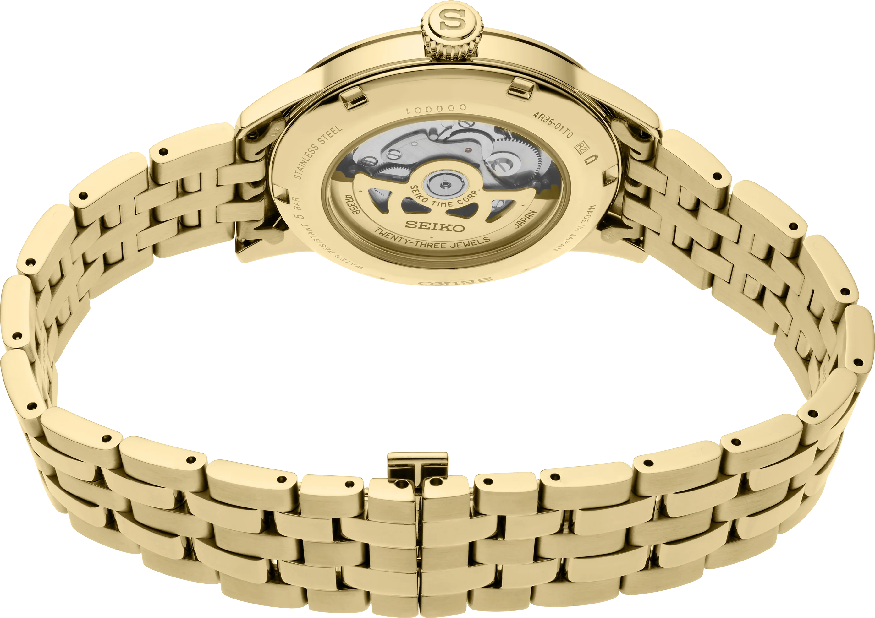 Gold Seiko watch with a detailed mechanism on a white background