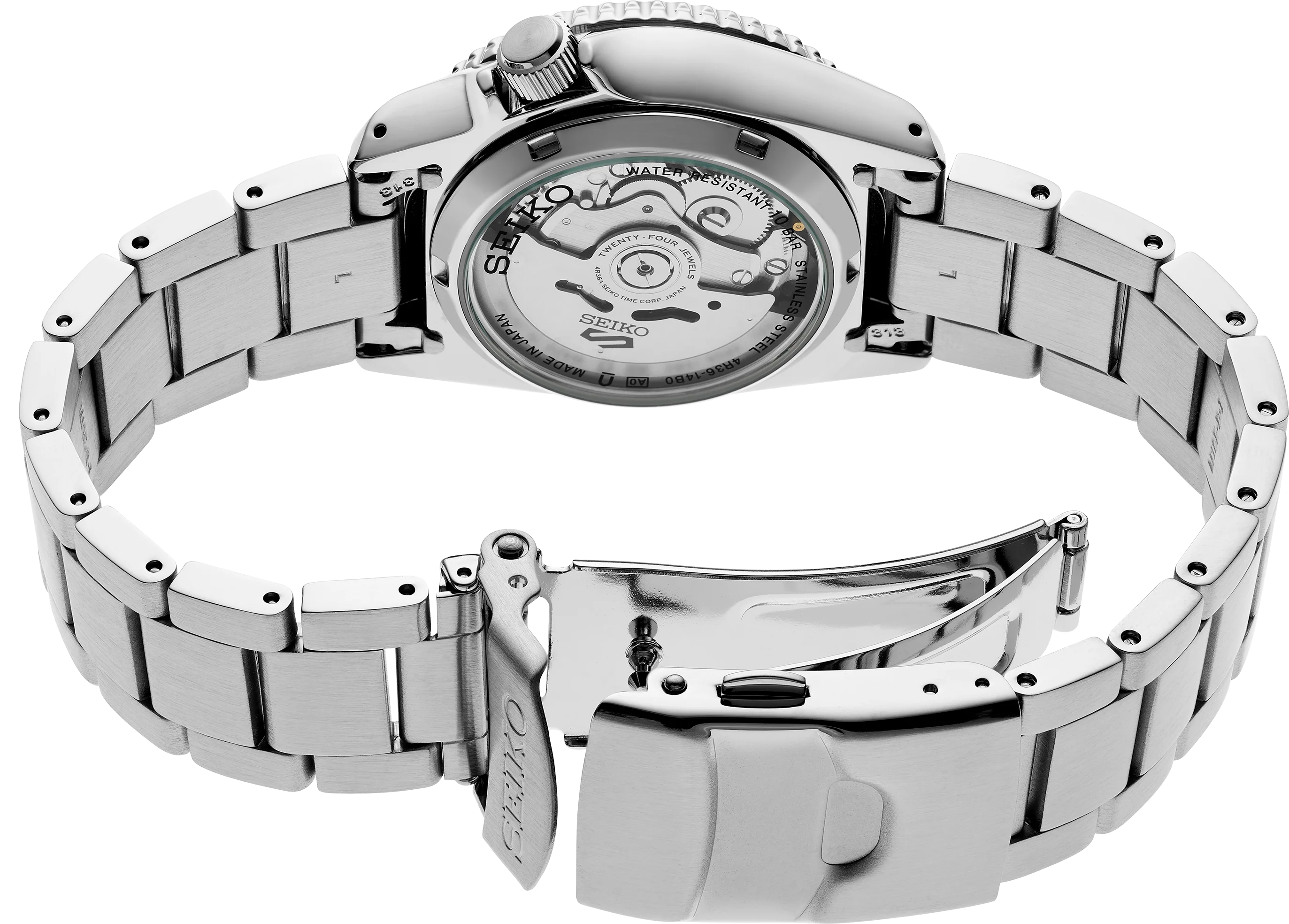Silver Seiko watch with open caseback on a white background