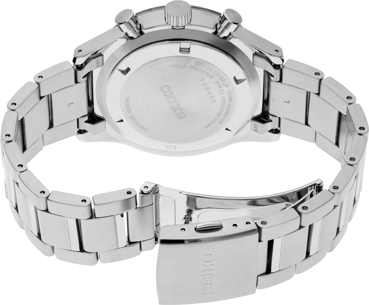 Back of silver watch on a white background