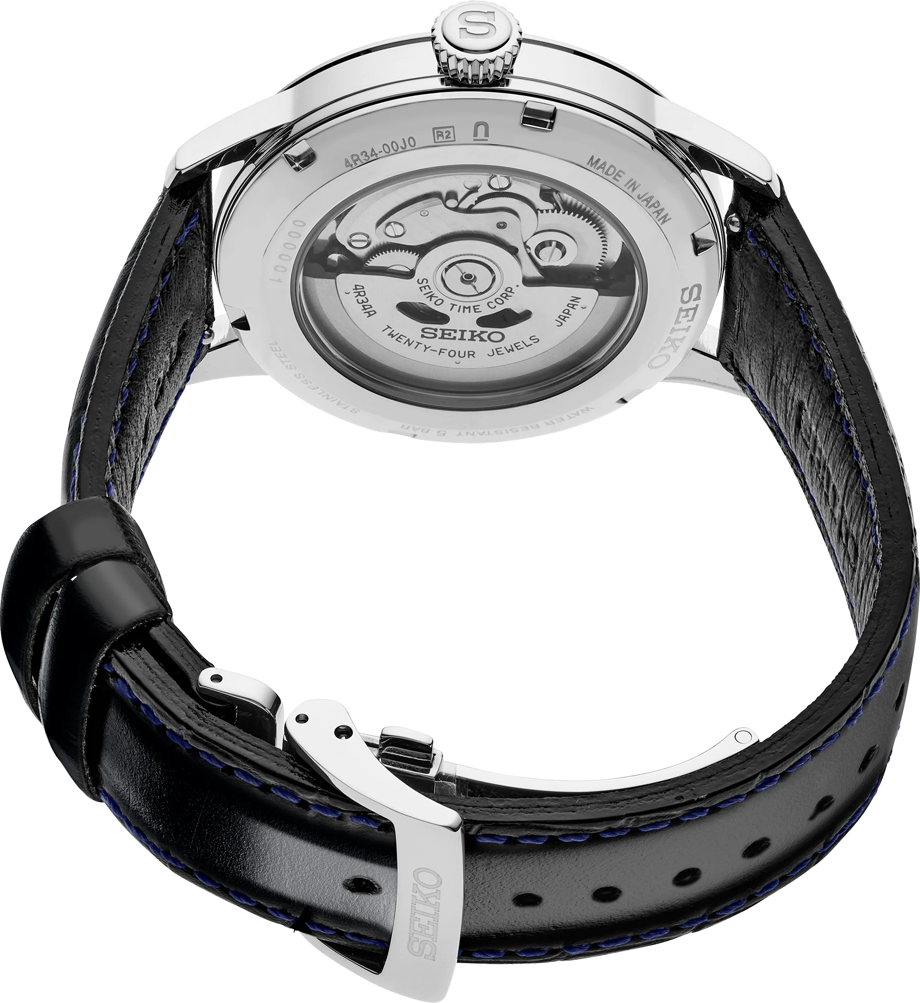 Seiko watch with navy leather strap and visible mechanical movement on a white background