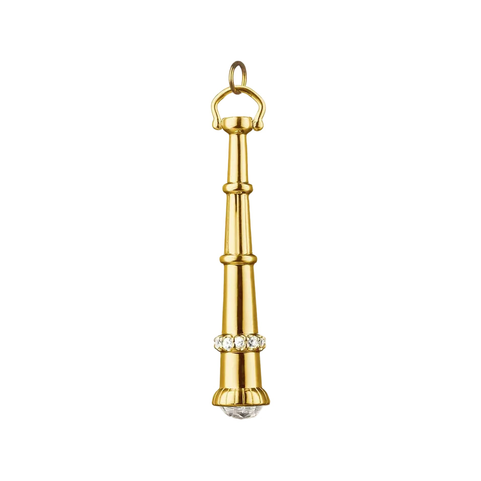 Gold telescope charm with diamonds and crystal lens on a white background