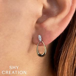 0.07ctw Diamond Teardrop Dangle Earring