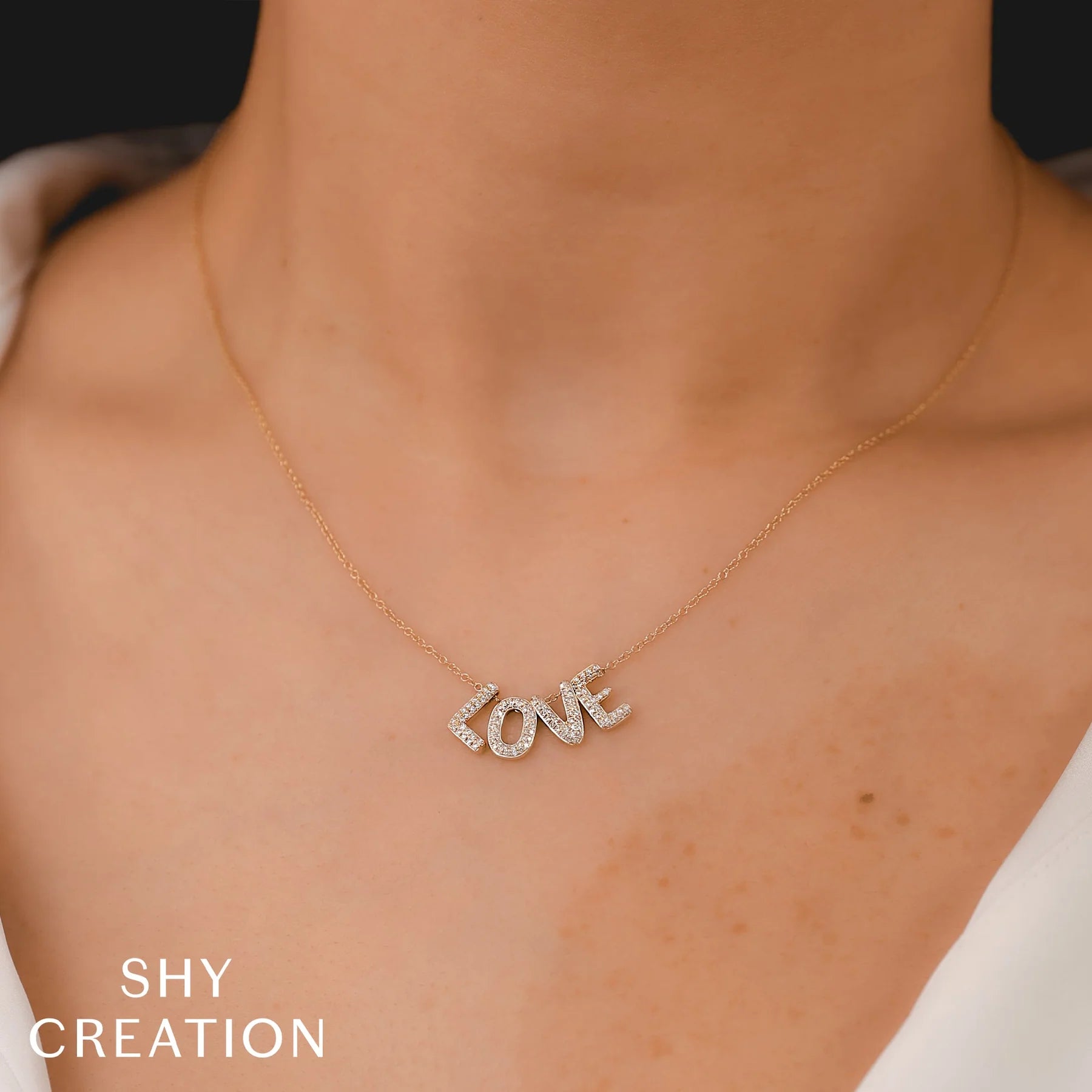 0.28ctw Diamond "Love" Necklace