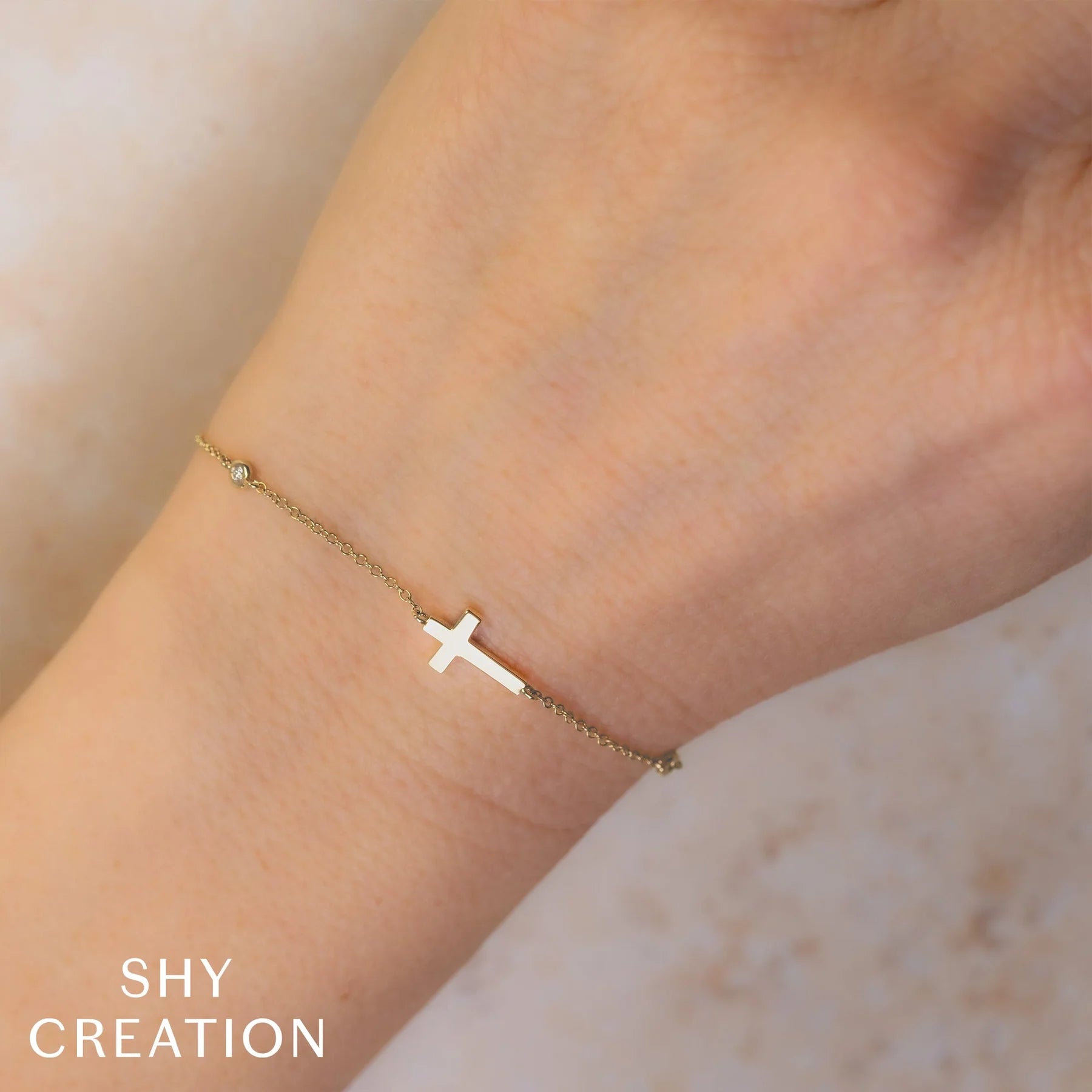 0.03ctw Diamond Bezel Cross Bracelet