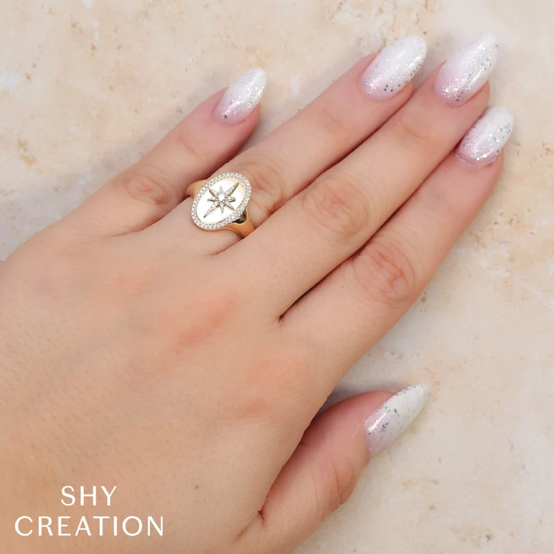 0.18ctw Diamond Star Oval Ring