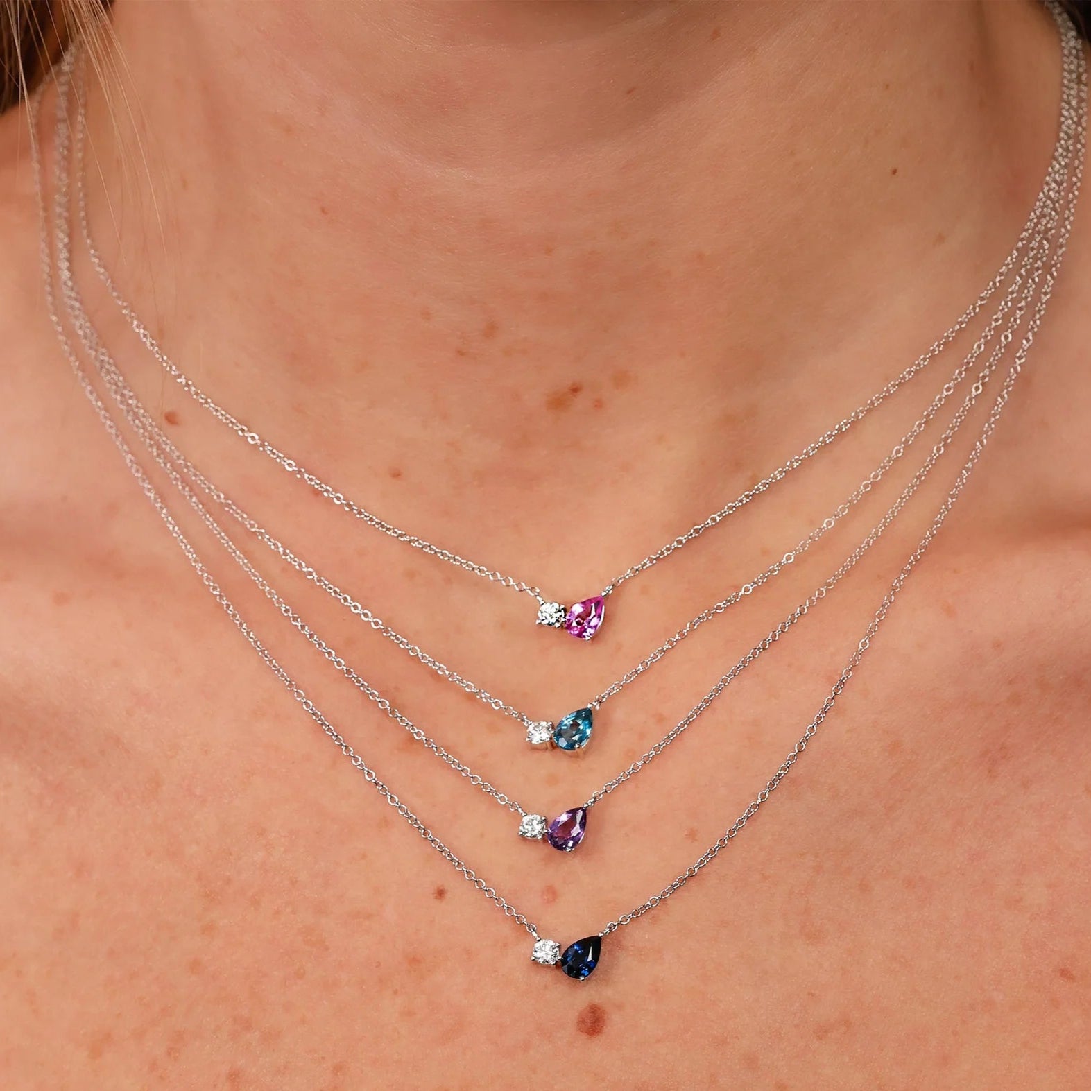 0.11ctw Diamond & Swiss Blue Topaz Pear Necklace