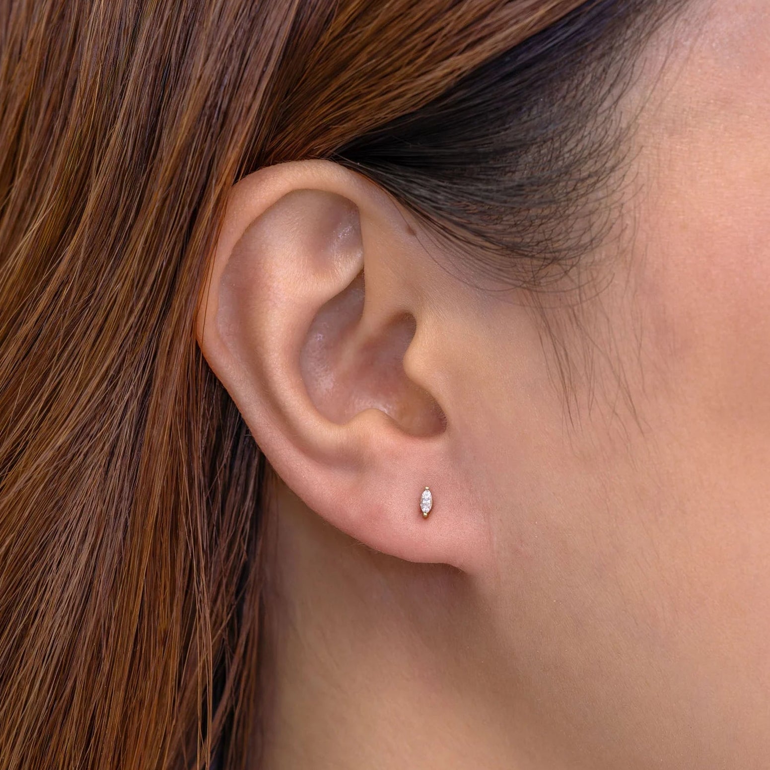 0.09ctw Diamond Marquise Stud Earring