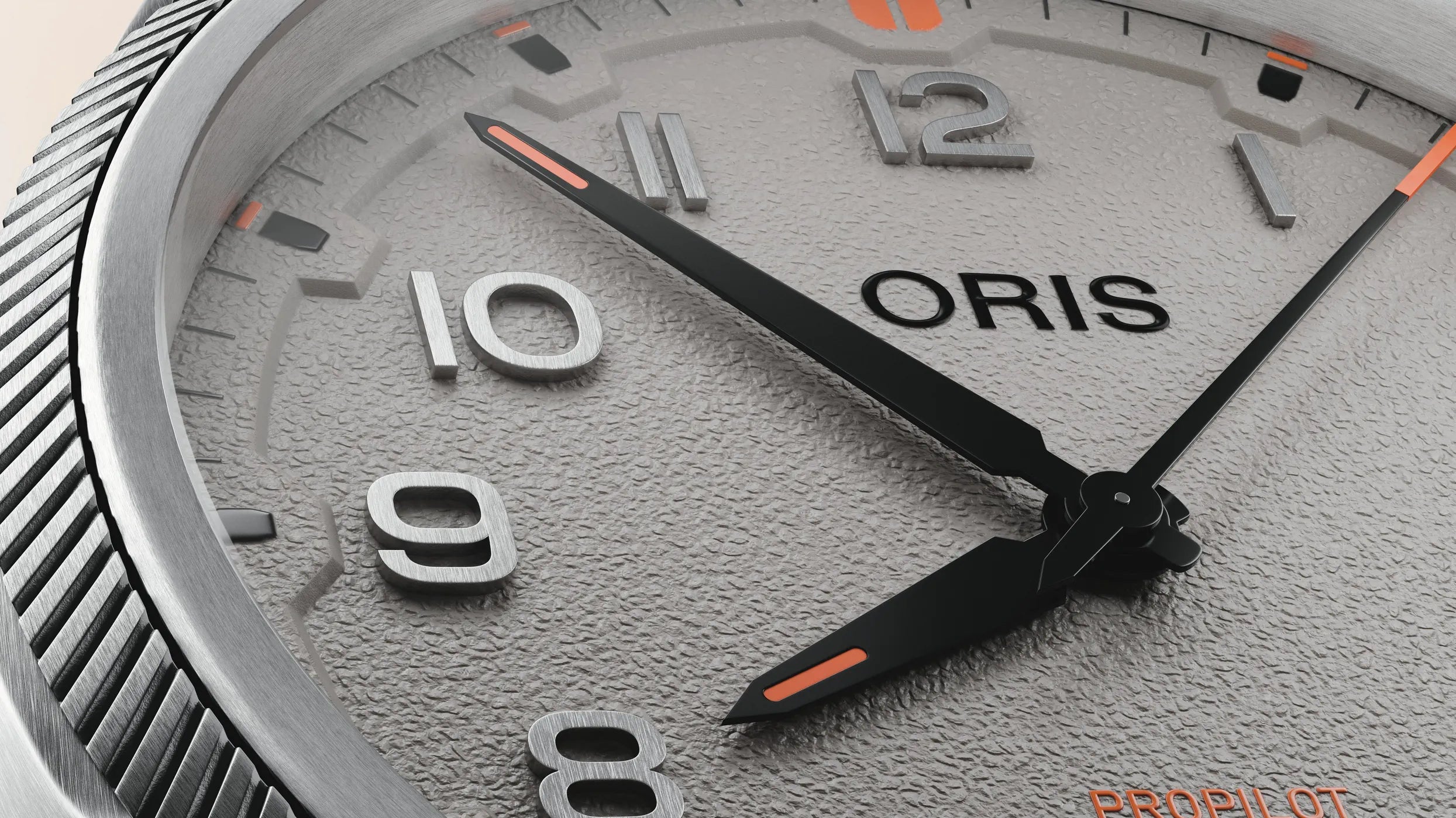 Close-up of an Oris watch face with detailed design.