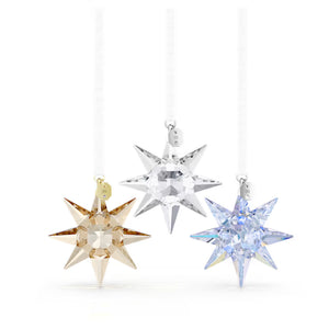 3 star ornaments in brown, blue and clear crystals with white ribbon on a white background