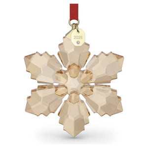 2026 annual edition festive ornament in a champagne color with red ribbon