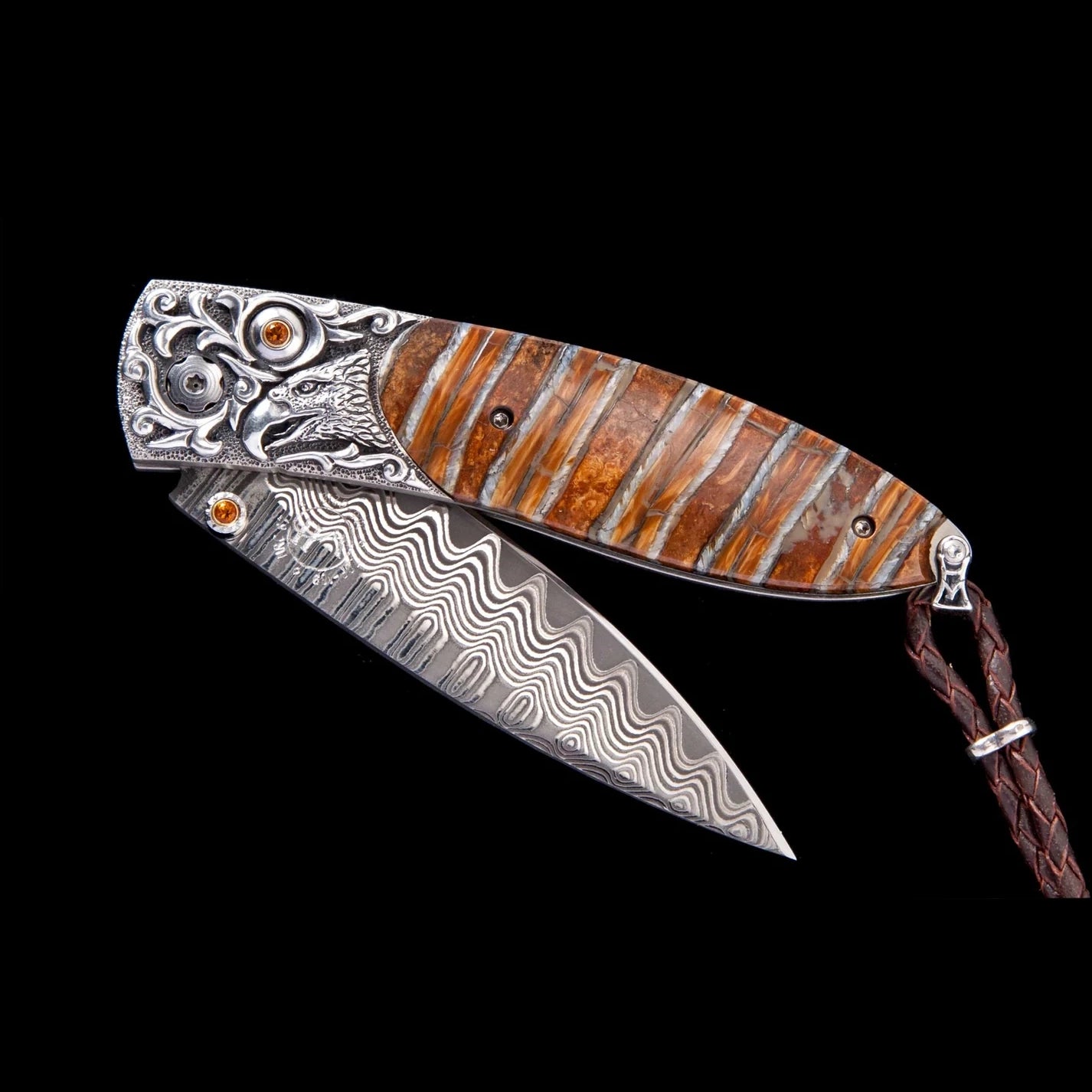 A decorative folding pocket knife with a Damascus steel blade, ornate silver-toned metal guard, and a handle made of alternating bands of brown wood and silver-toned metal, shown against a solid black background.