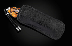 Black leather case with a lanyard on a black background