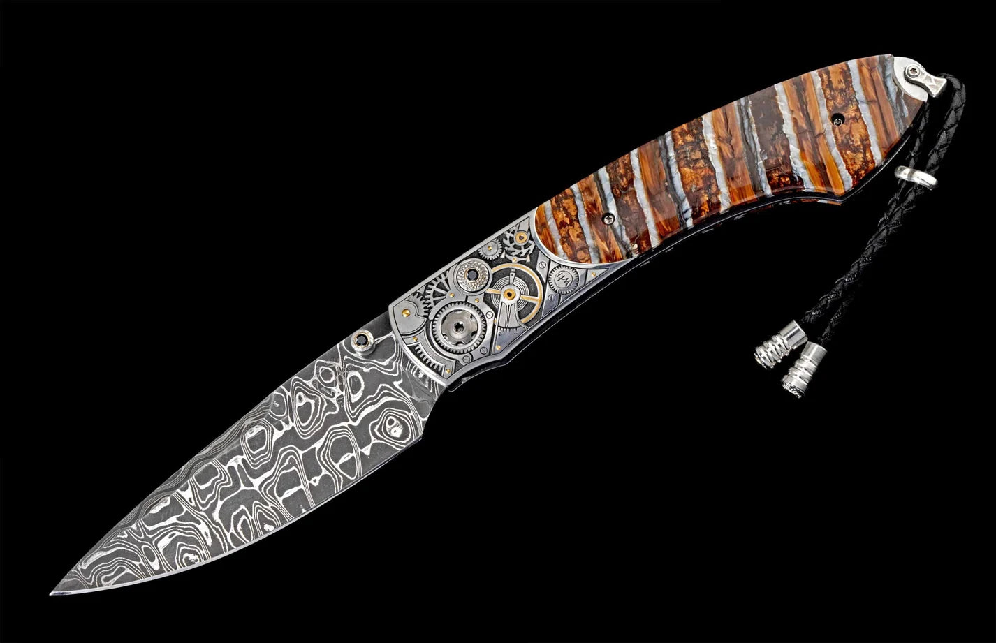 Angled B12 Watch Gears III knife with Hornets Nest damascus, watch-gear bolsters, mammoth-tooth inlay on black background