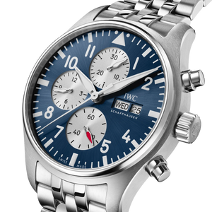 Silver watch with a blue dial on a white background