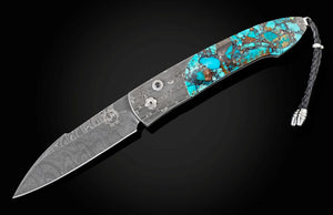 A folding pocket knife with a Damascus steel blade and a turquoise stone inlay handle, shown against a dark gradient background.