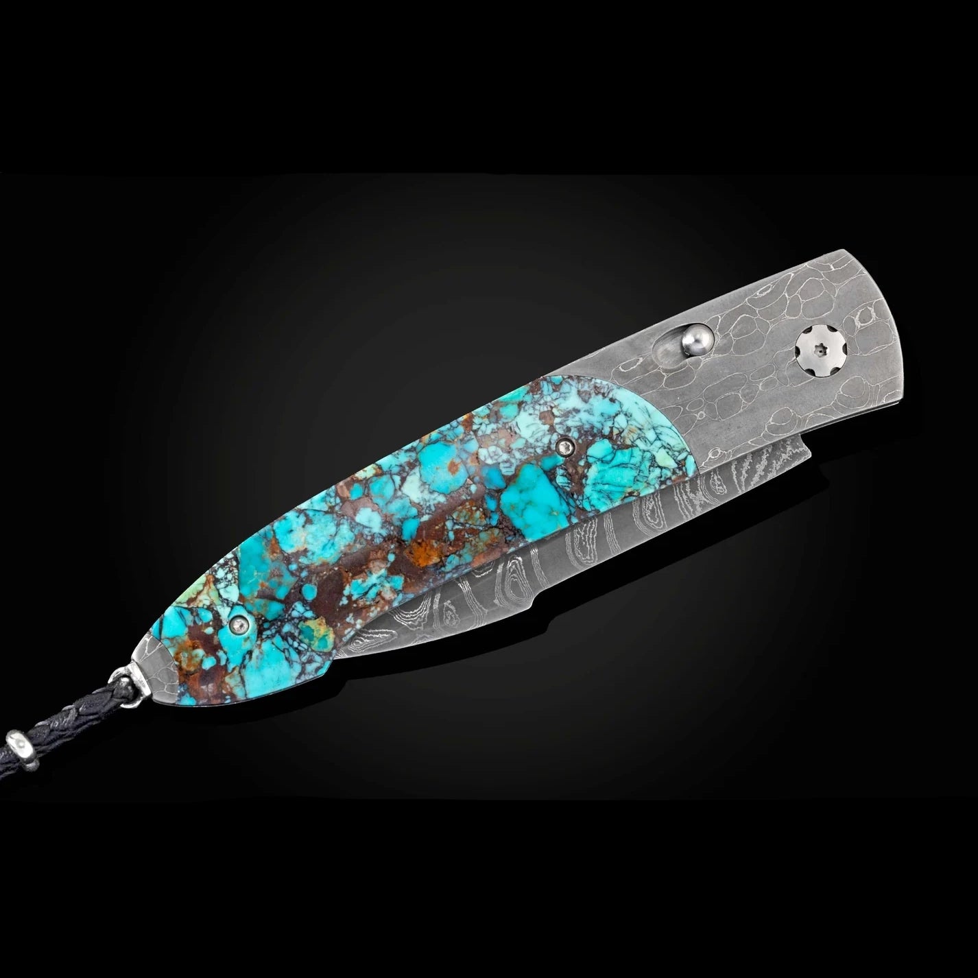 A folding pocket knife with a textured silver steel blade and a handle inlaid with vibrant turquoise, brown, and orange natural stone. The knife is shown open against a dark black background.