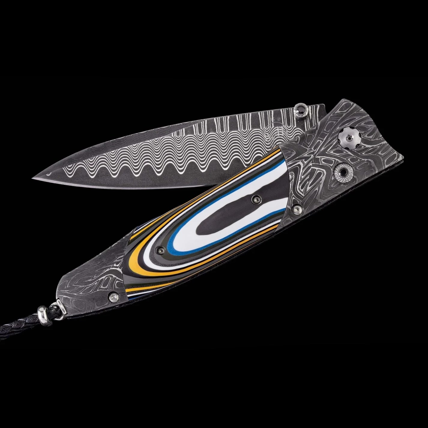 A Damascus steel folding pocket knife with a patterned blade and a decorative handle featuring black, white, blue, and yellow inlay, shown against a solid black background.